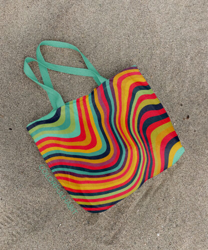 Printable Art Download In A Colorful Abstract Wavy Stripes Digital Design by ColorfulHabit Presented on a Canvas Tote on the Sand
