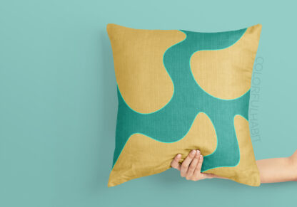 Printable Digital Art Download in a Yellow Aqua Minimal Abstract Design by ColorfulHabit Presented on a Pillow Held by a Hand