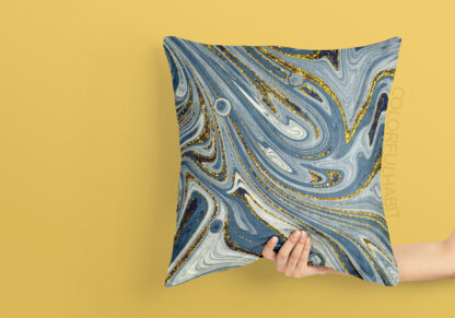 Printable Digital Fluid Art Download in Swirls of Blues and Gold Pattern by ColorfulHabit Presented on a Pillow Held by a Hand