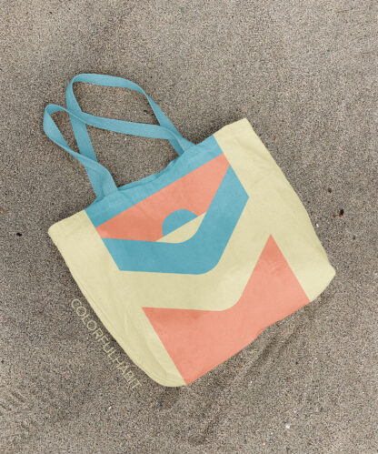 Free Printable Minimalist Geometric Wall Art by ColorfulHabit Presented on a Canvas Tote on the Sand