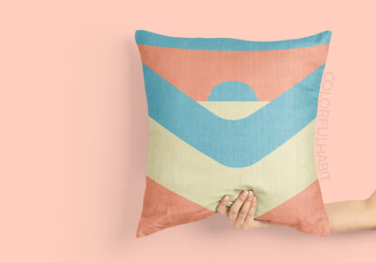 Free Printable Minimalist Geometric Wall Art by ColorfulHabit Presented on a Pillow Held by a Hand