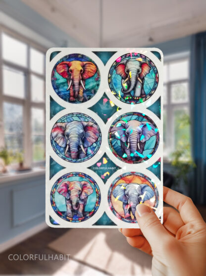 Hand Holding Elephants Holographic Sticker by ColorfulHabit 2